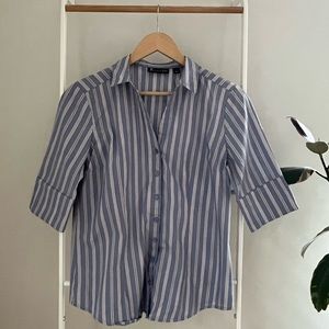 Button up shirt has all buttons no stain. In good condition